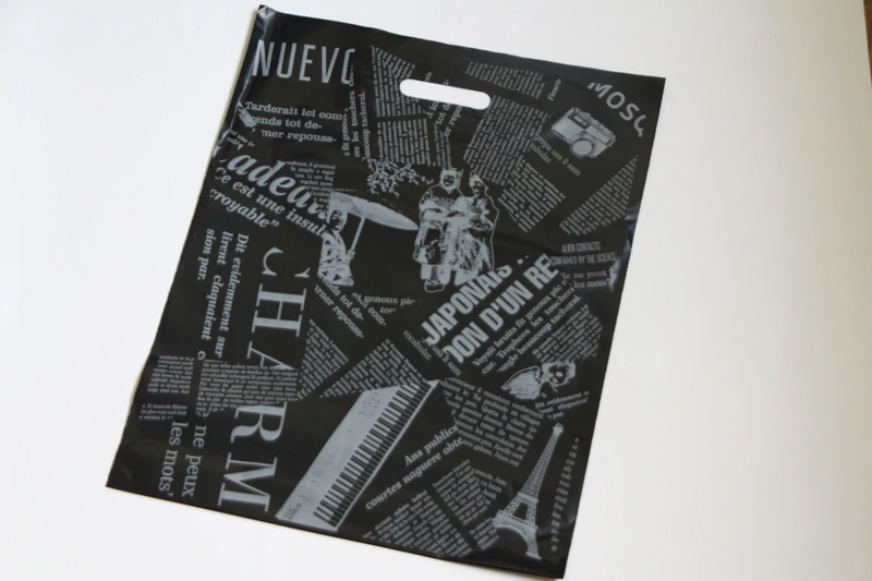 Пакет с выруб.ручкой 40х50 (90) "Газета" черный / 50 / 100